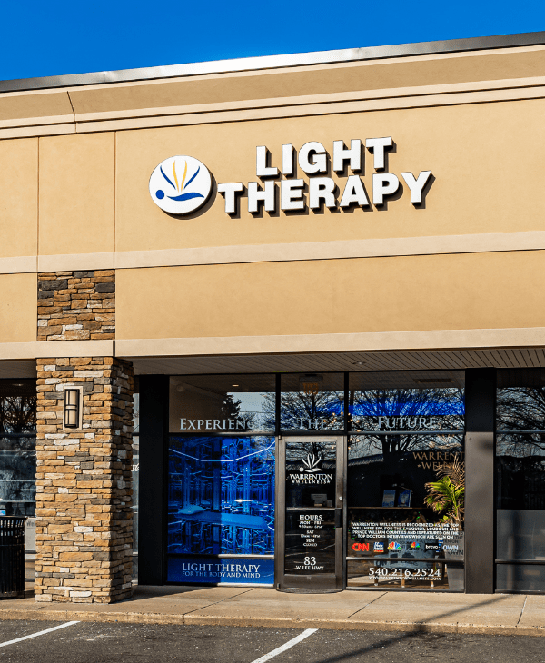 Light Therapy storefront with blue windows.